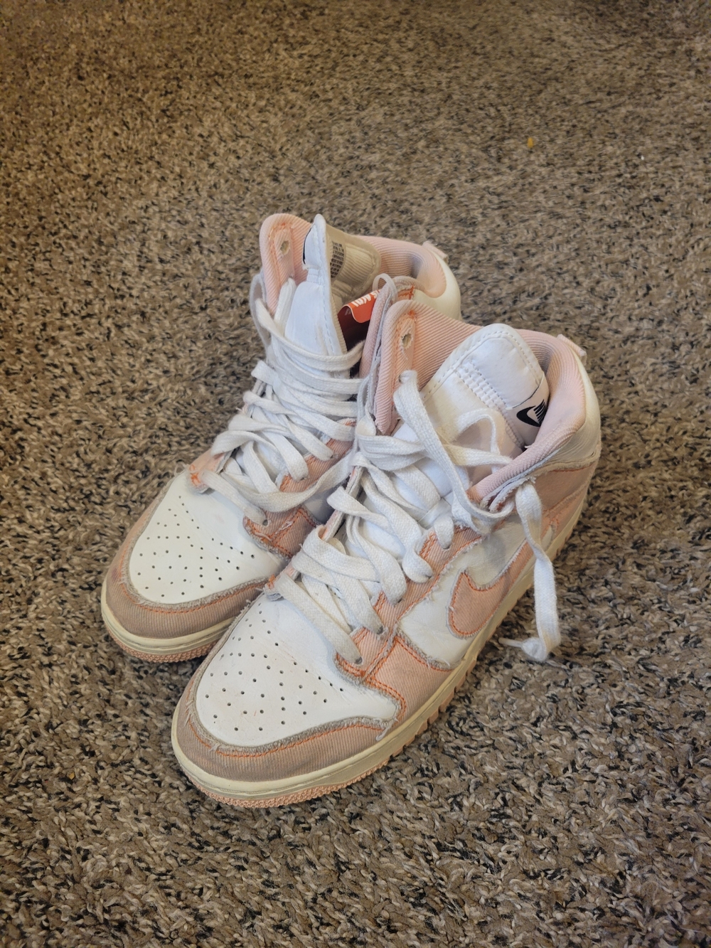 Nike Women’s Pink and White High-Top Sneakers